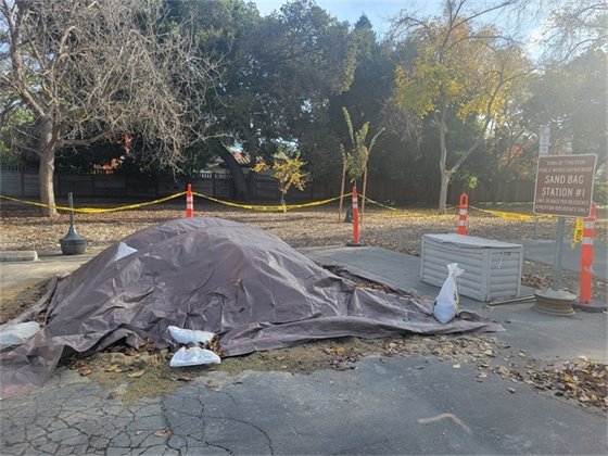 sand covered by a tarp in holbrook palmer park