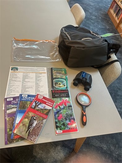 picture of contents of park pass backpack at library